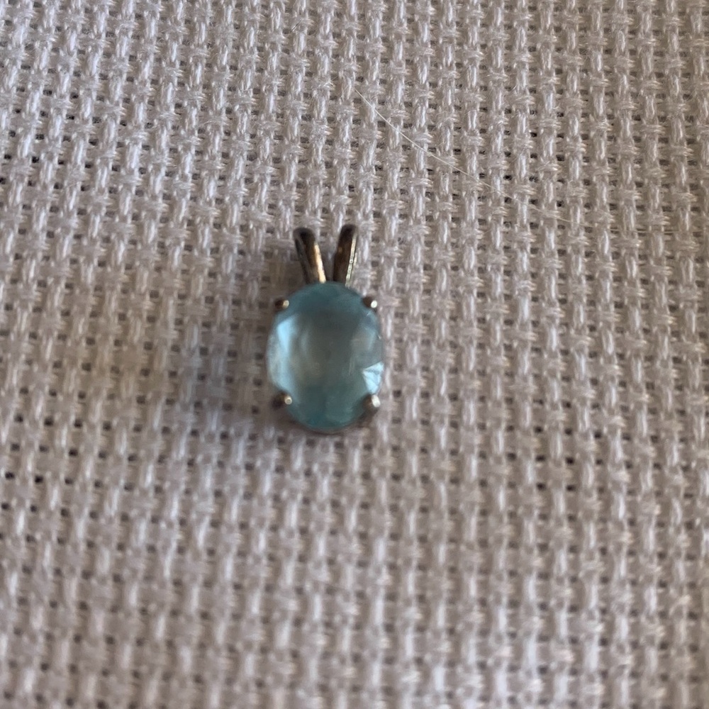 Vintage Lab Created Oval Blue Topaz Pendant set in Sterling Silver